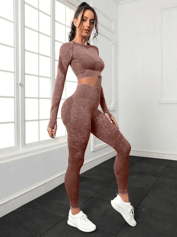 Woman wearing seamless high waist yoga set, showcasing flexible eco-friendly fabric ideal for workouts and yoga.